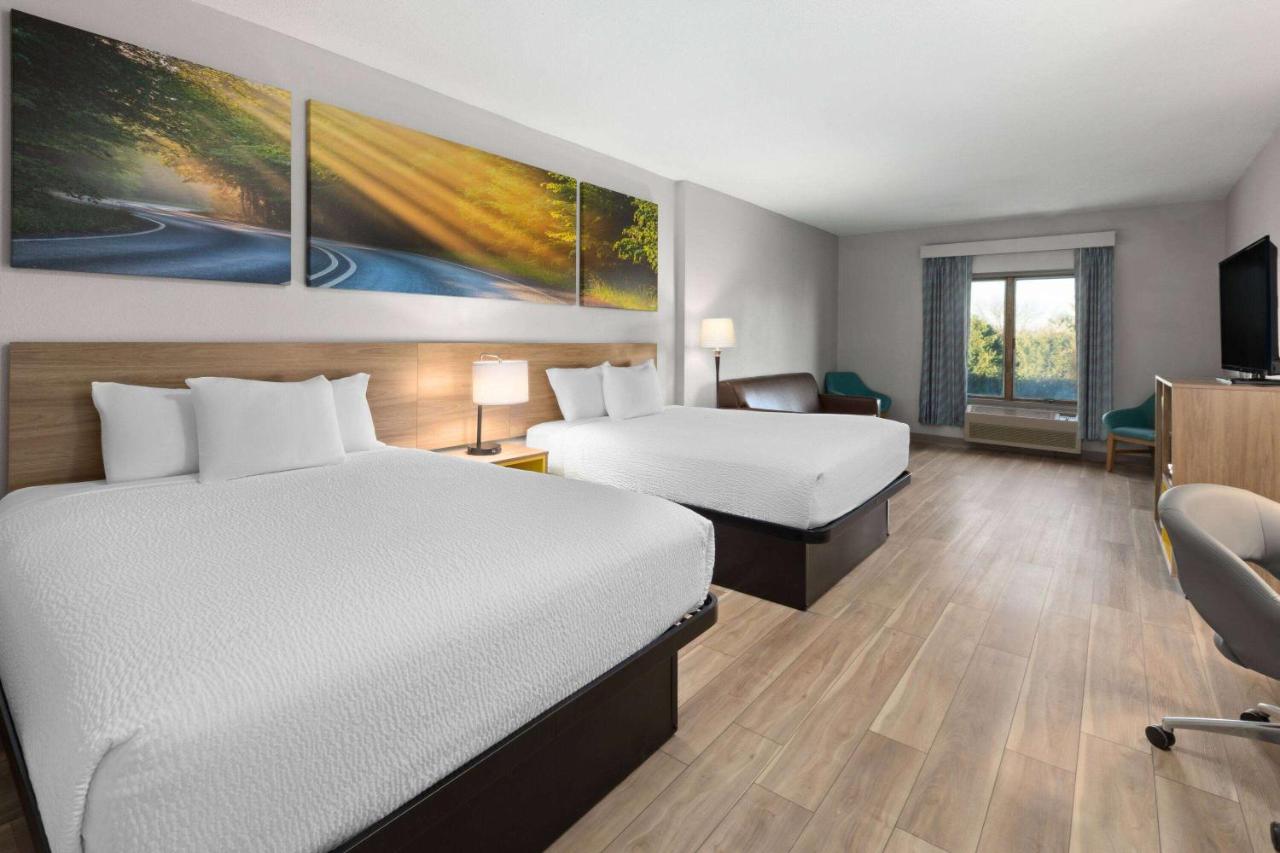 Deluxe Queen Room with Two Queen Beds - Non-Smoking at Days Inn by Wyndham Hutchinson