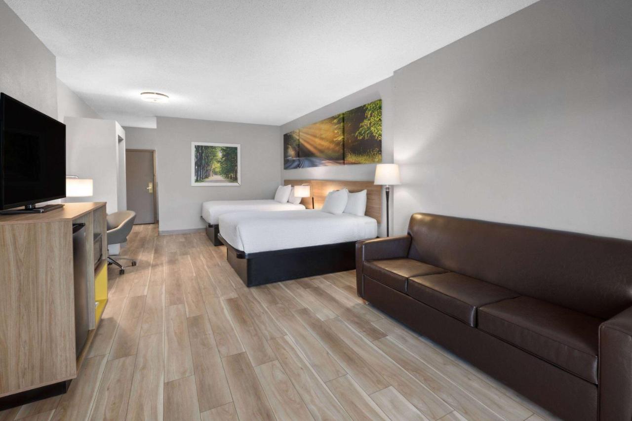 Deluxe Queen Room with Two Queen Beds - Non-Smoking at Days Inn by Wyndham Hutchinson
