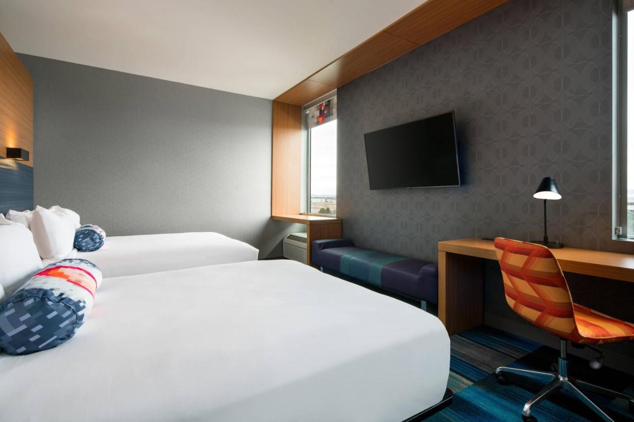 Queen Room with Two Queen Beds at Aloft by Marriott Denver Airport at Gateway Park