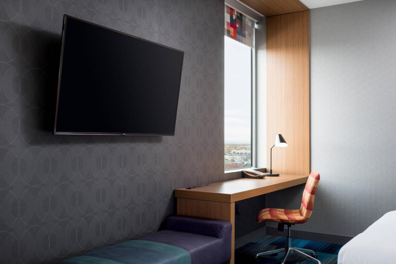 Queen Room with Two Queen Beds at Aloft by Marriott Denver Airport at Gateway Park