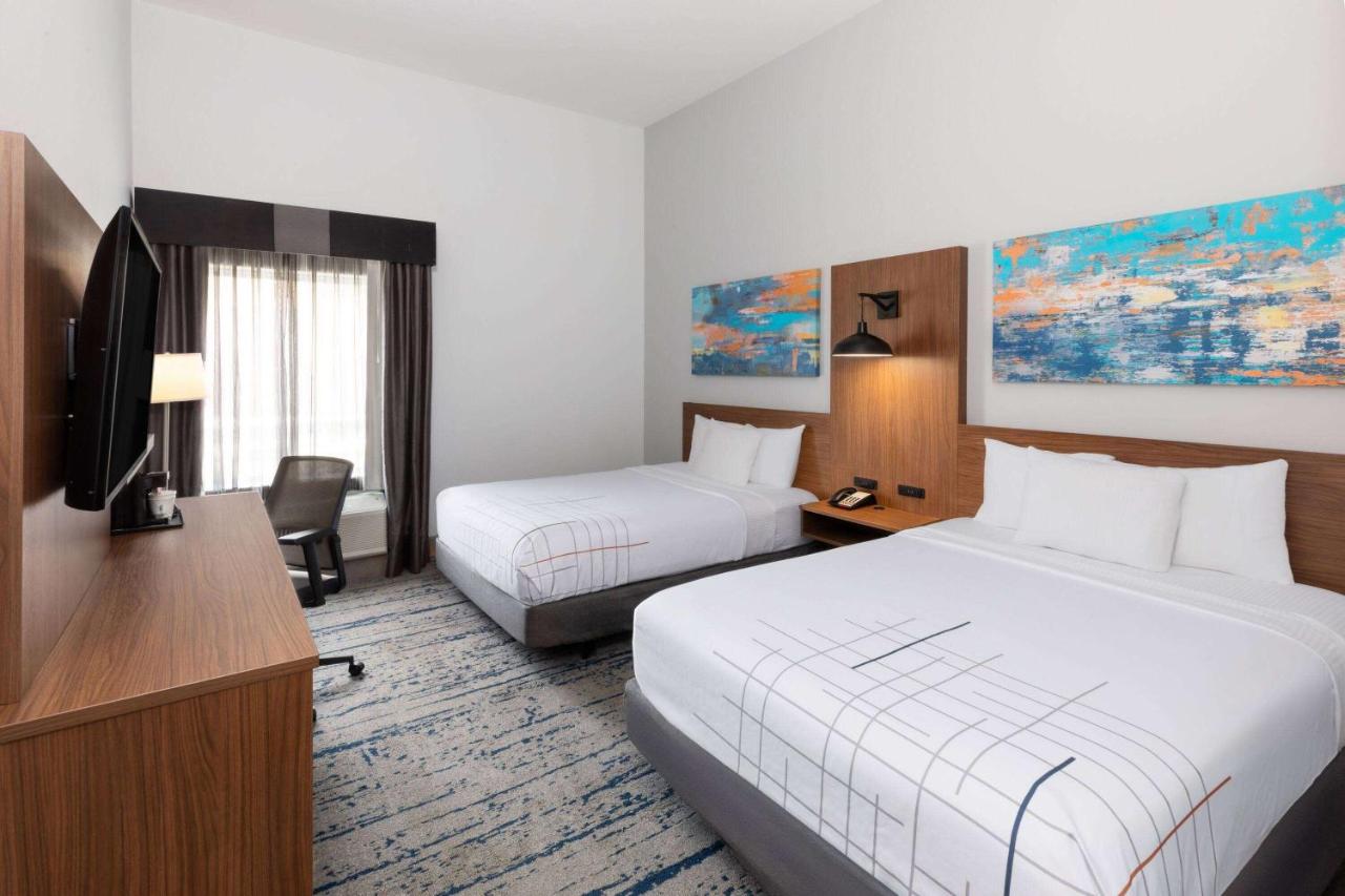 Queen Room with Two Queen Beds and Roll-In Shower - Mobility Accessible/Non-Smoking at La Quinta Inn & Suites by Wyndham Rockport - Fulton