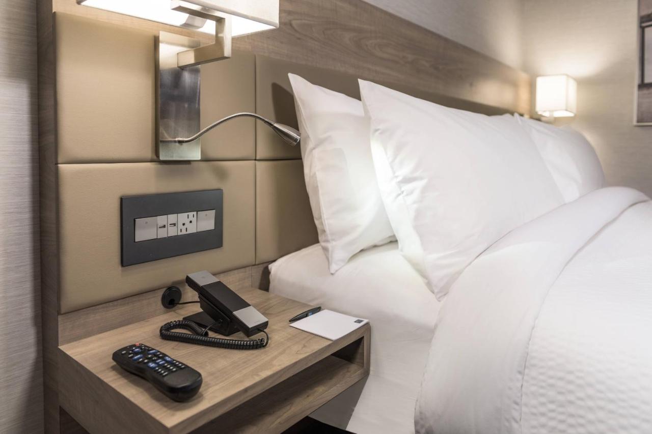 Queen Room with Two Queen Beds at AC Hotel by Marriott Boston Cambridge
