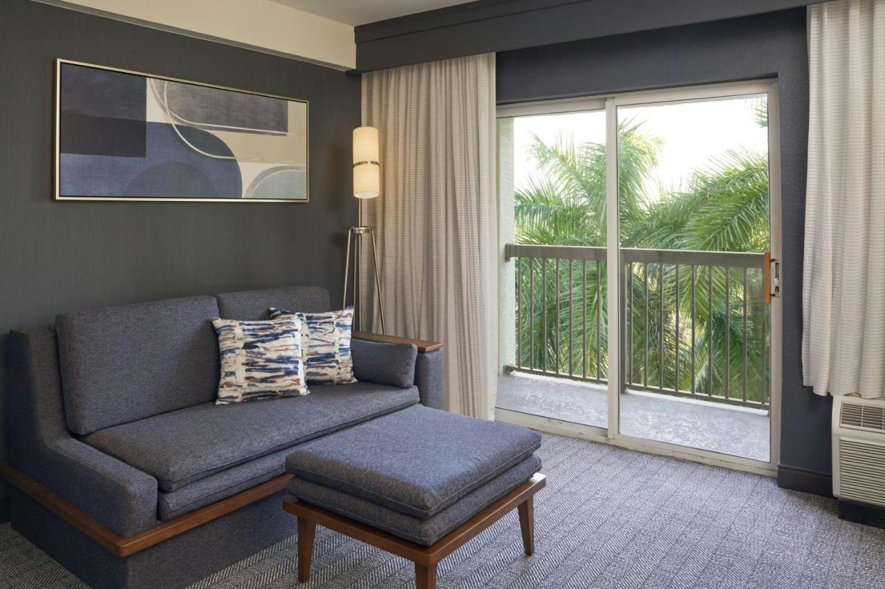 King Room with Sofa Bed and Balcony at Courtyard by Marriott Fort Lauderdale Weston