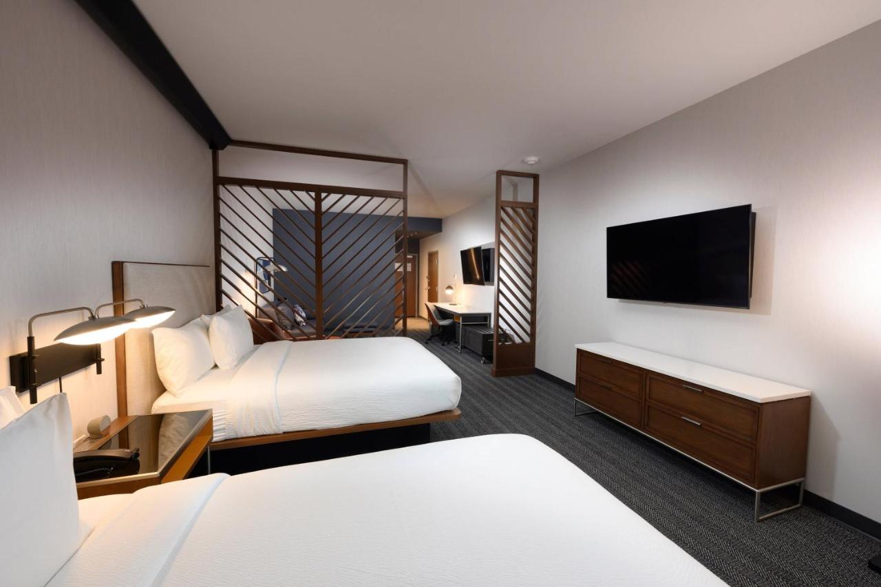 Queen Guest Room with 2 Queen Beds and Sofa Bed at Courtyard by Marriott Charlotte Waverly