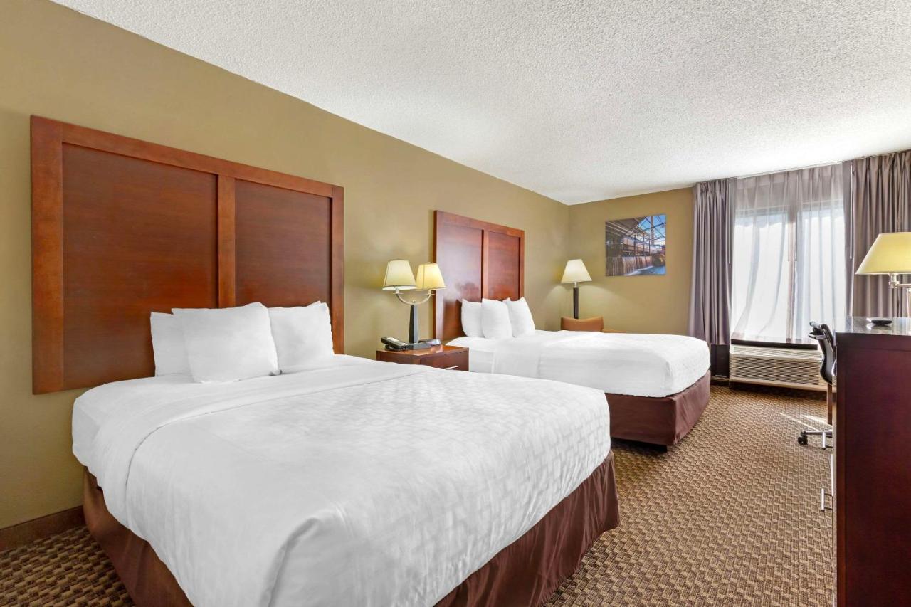 Queen Room with Two Queen Beds - Non-Smoking - Pet Friendly at Clarion Pointe Durham Research Triangle Park