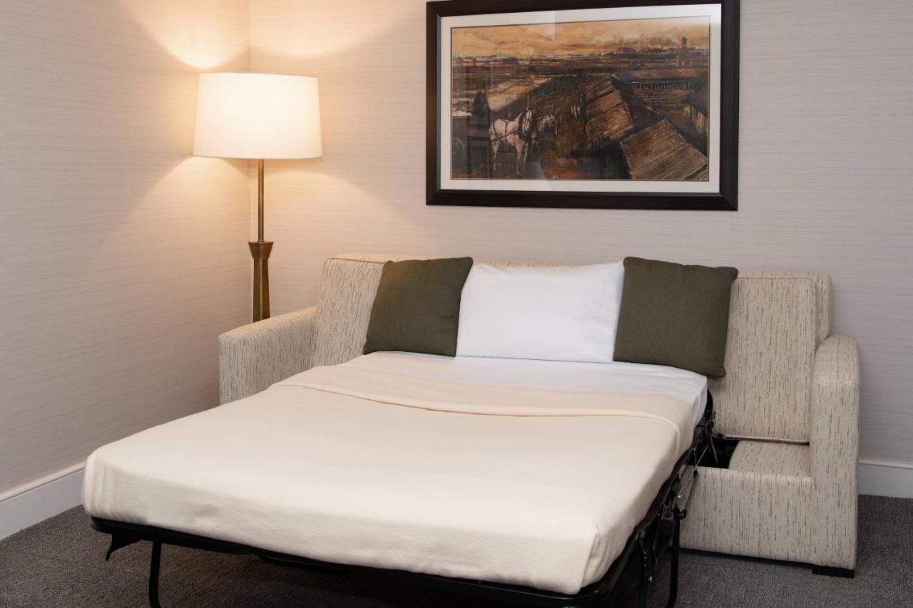 Large King Room with Sofa Bed and Roll-in Shower - Mobility Accessible at Marriott Syracuse Downtown