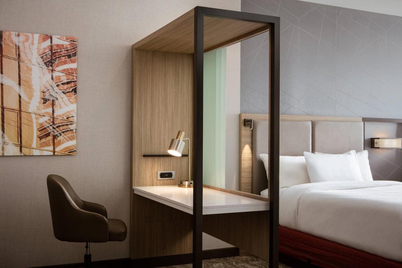Suite with Two Queen Beds and a sofa at SpringHill Suites by Marriott Ames