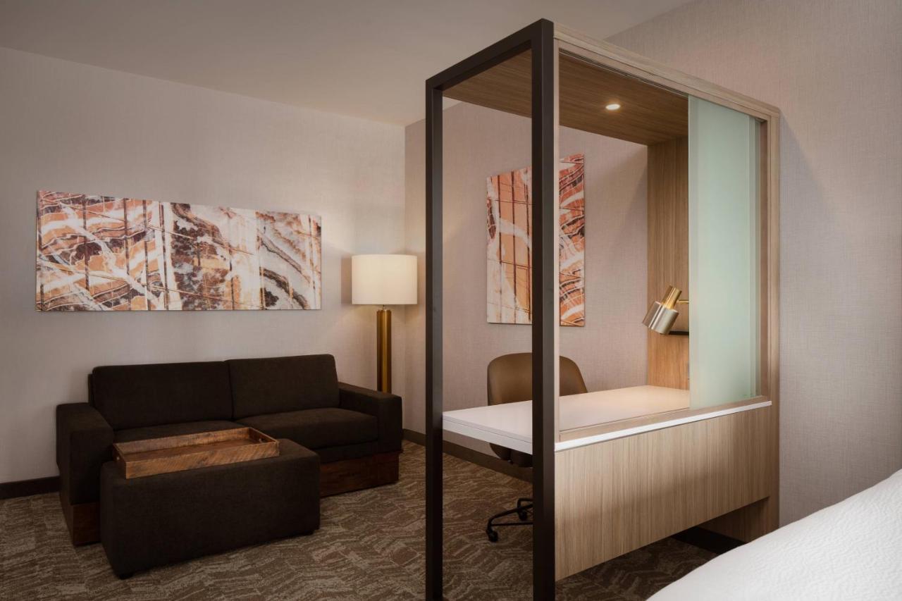Suite with Two Queen Beds and a sofa at SpringHill Suites by Marriott Ames