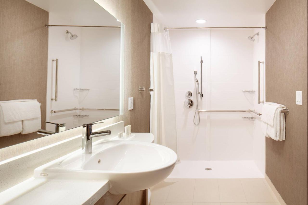 Suite with Two Queen Beds and a sofa at SpringHill Suites by Marriott Ames