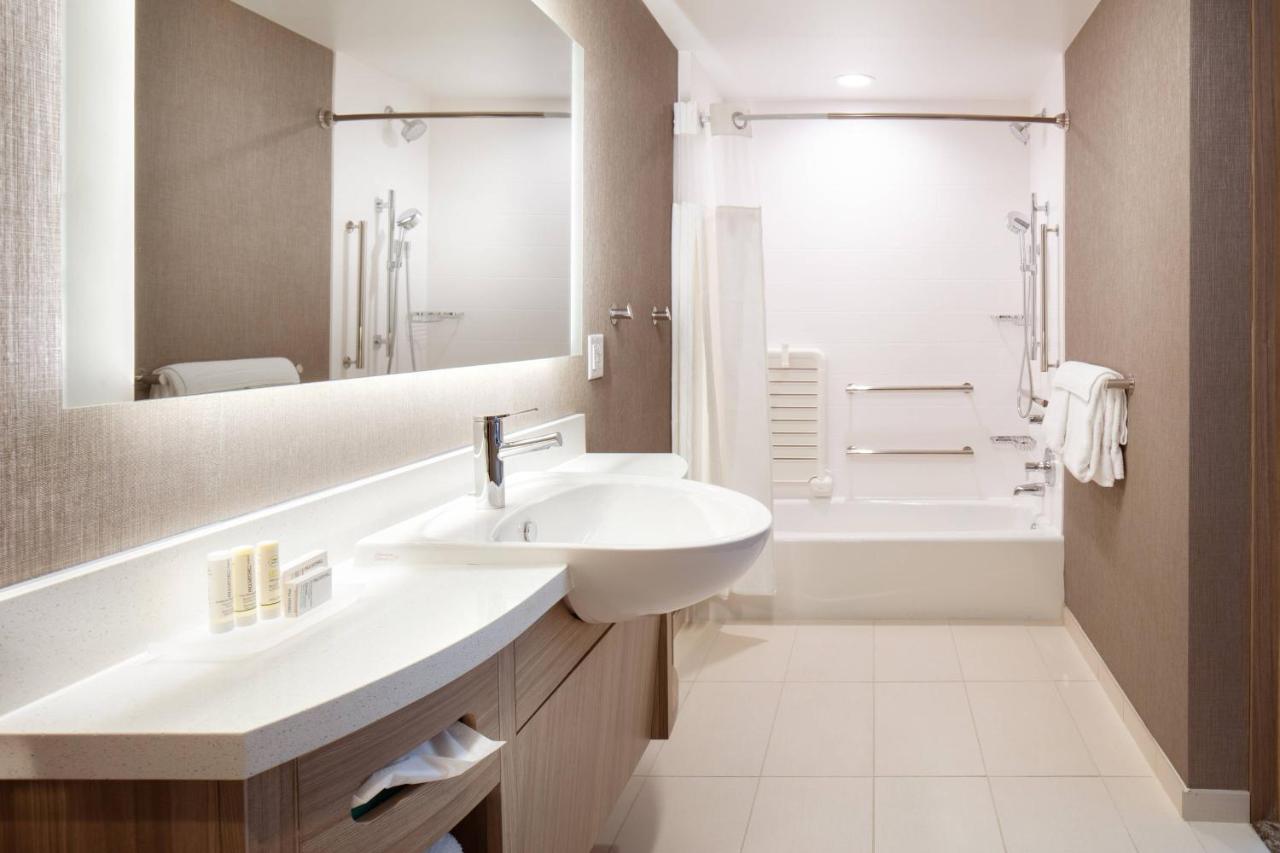 Suite with Two Queen Beds and a sofa at SpringHill Suites by Marriott Ames