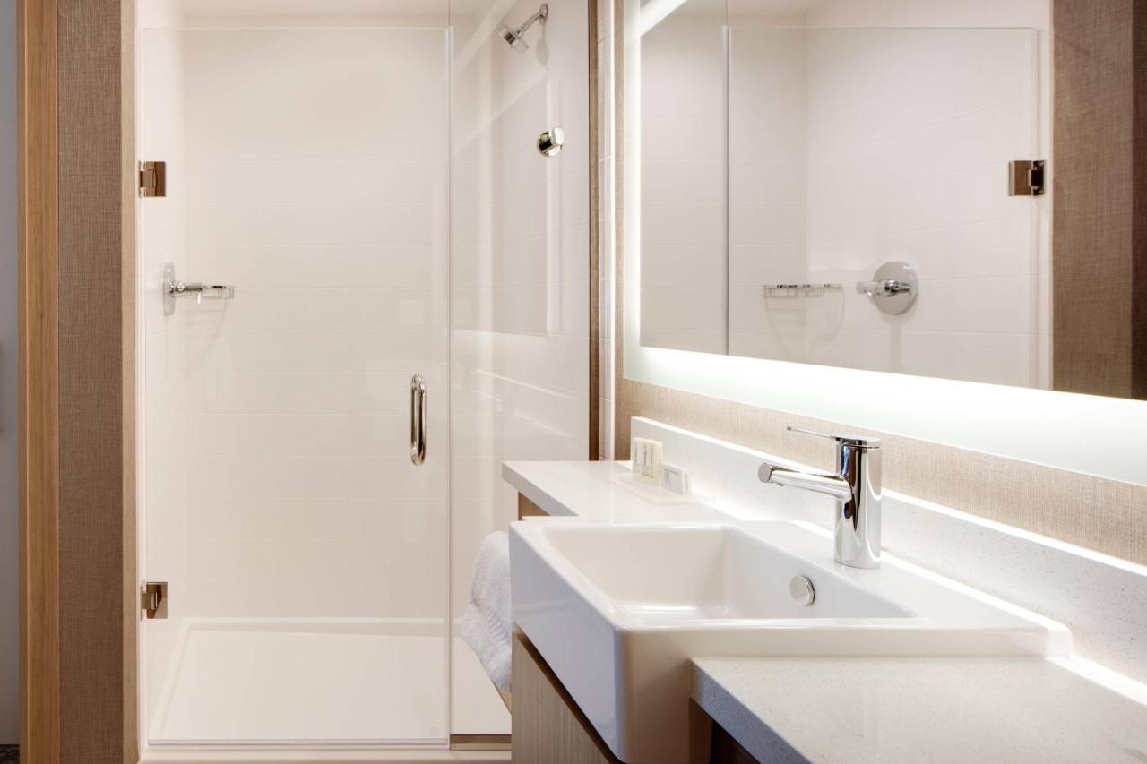 Suite with Two Queen Beds and a sofa at SpringHill Suites by Marriott Ames