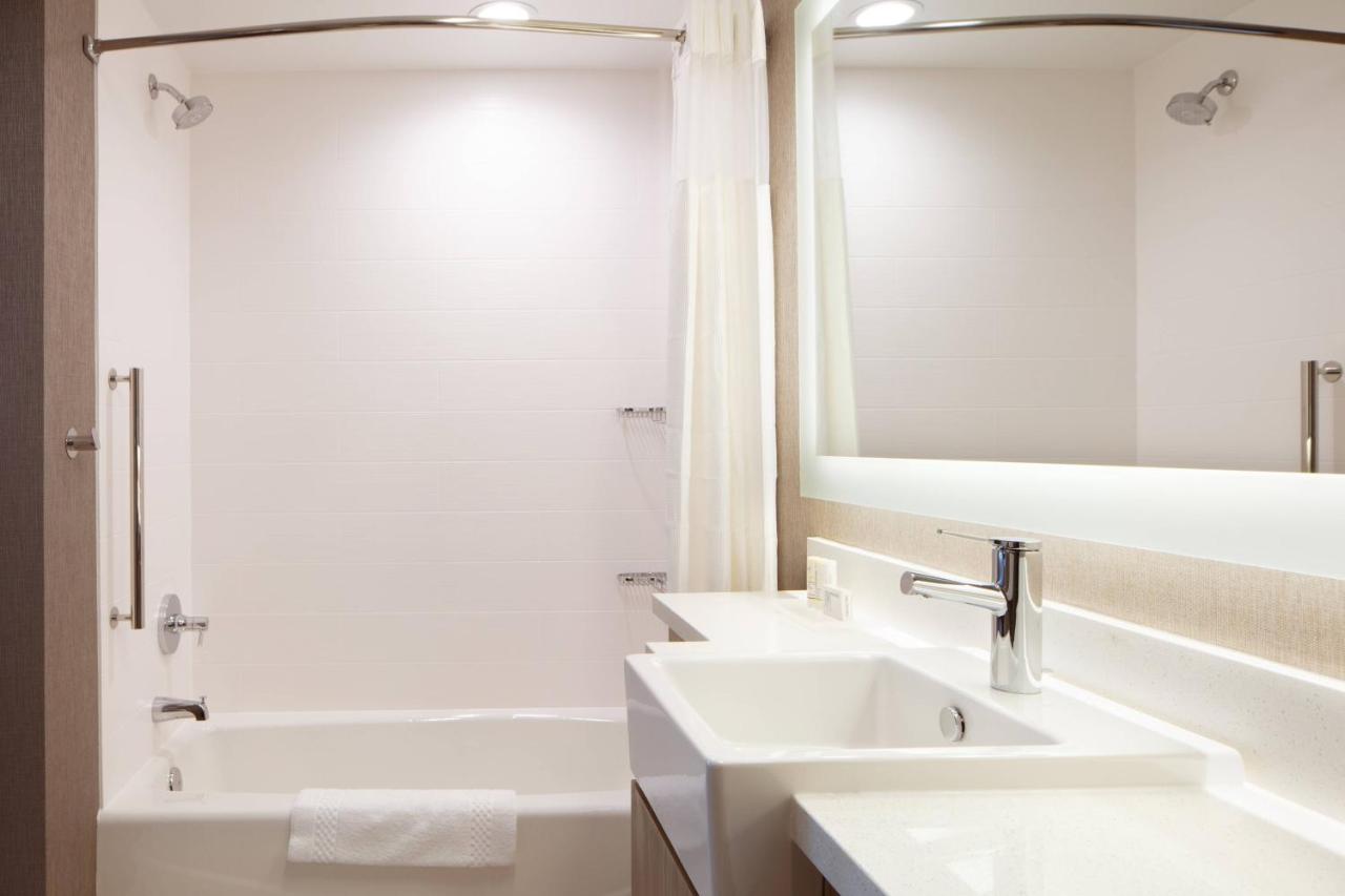 Suite with Two Queen Beds and a sofa at SpringHill Suites by Marriott Ames