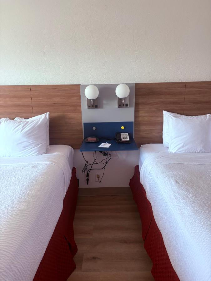 Queen Room with Two Queen Beds - Non-Smoking at Microtel Inn & Suites by Wyndham Denver Airport