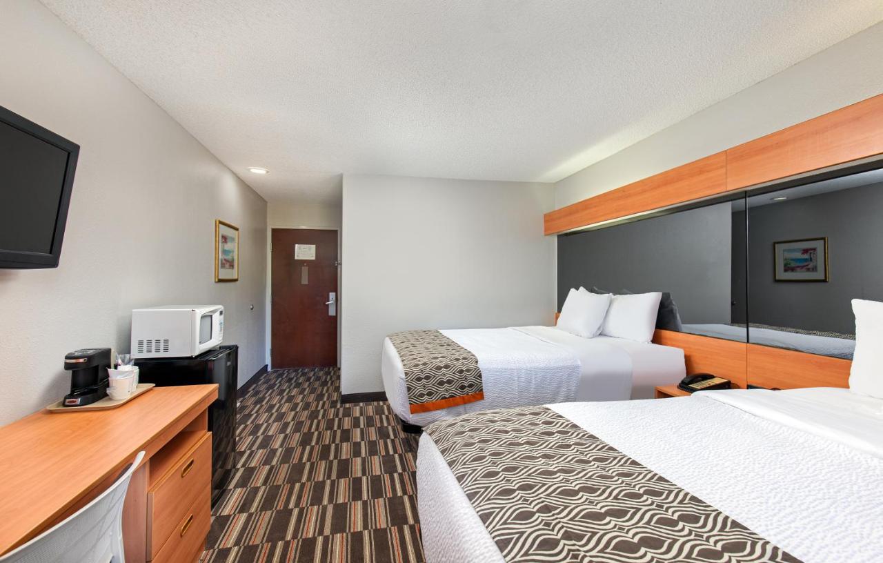 Queen Room with Two Queen Beds - Non-Smoking at Microtel Inn & Suites by Wyndham Cordova Memphis I-40 East