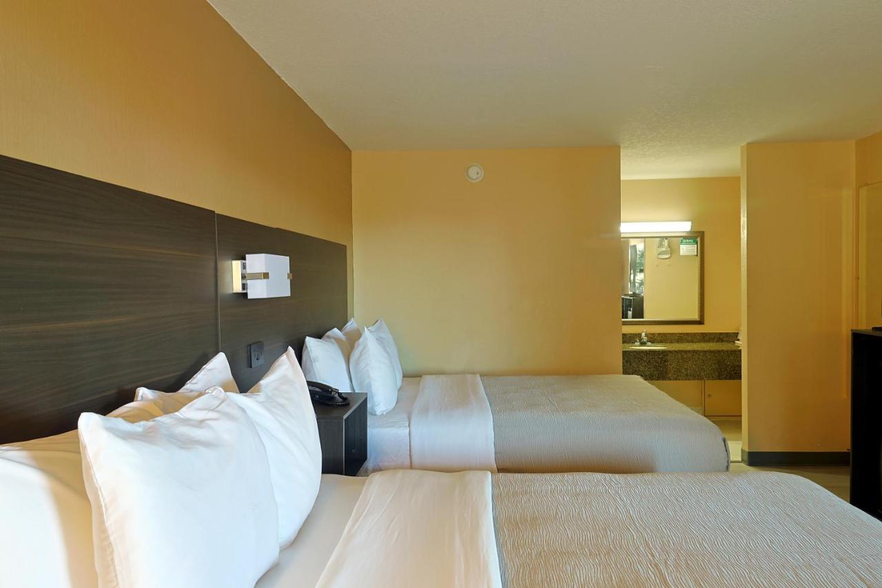 Queen Room with Two Queen Beds - Accessible/Non-Smoking at Quality Inn Kennedy Space Center