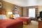Queen Room with Two Queen Beds at Country Inn & Suites by Radisson, Sycamore, IL