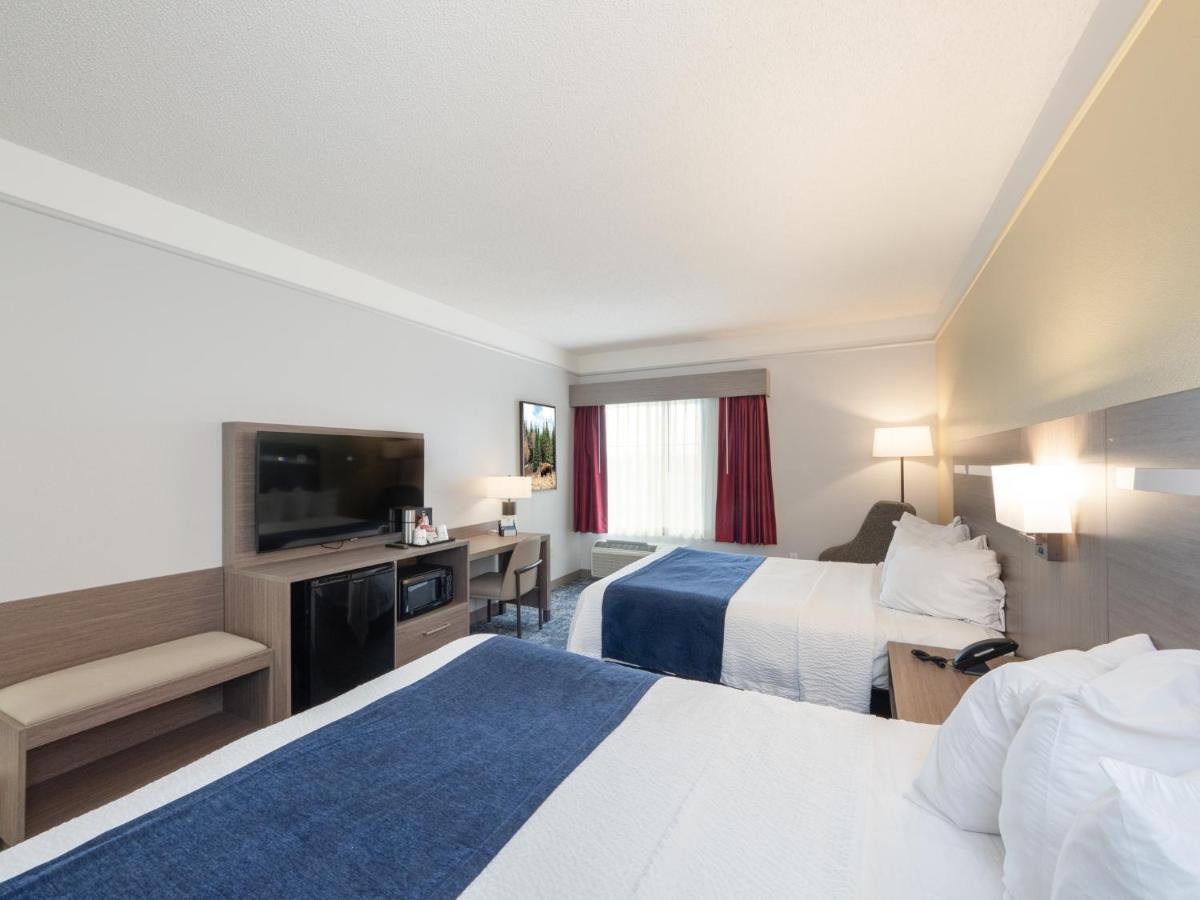 Queen Room with Two Queen Beds - Non-Smoking at SureStay Plus Hotel by Best Western Billings