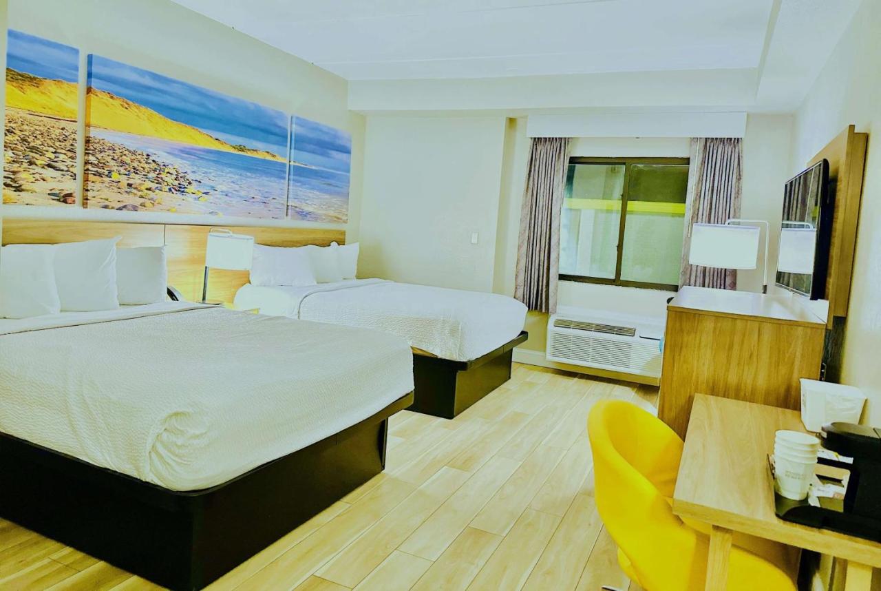 Queen Room with Two Queen Beds - Mobility Access/Non-Smoking at Days Inn by Wyndham Rutland/Killington Area