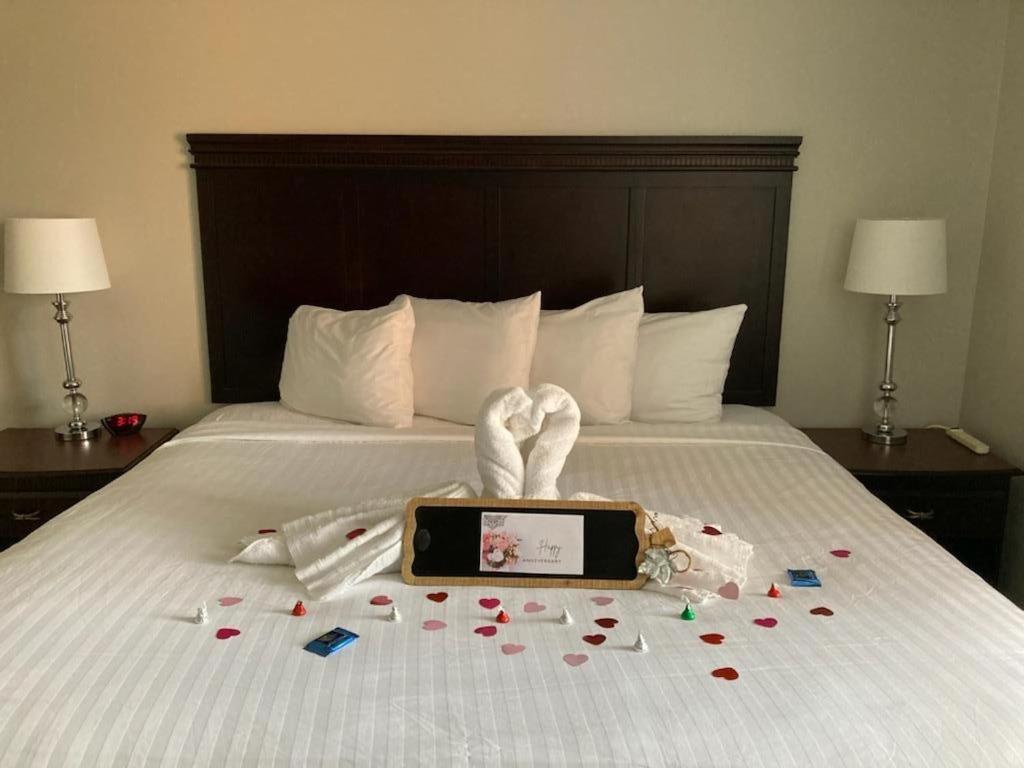 Deluxe Queen Room with Two Queen Beds and Sofa Bed at Ashley Quarters Hotel Cincinnati Airport