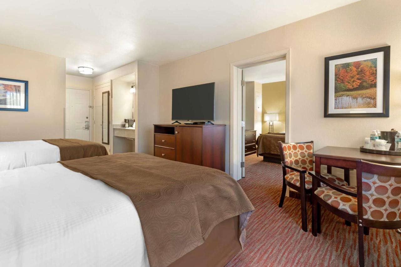 Suite with Two Queen Beds and One King Bed Room at Best Western Plus Concord Inn