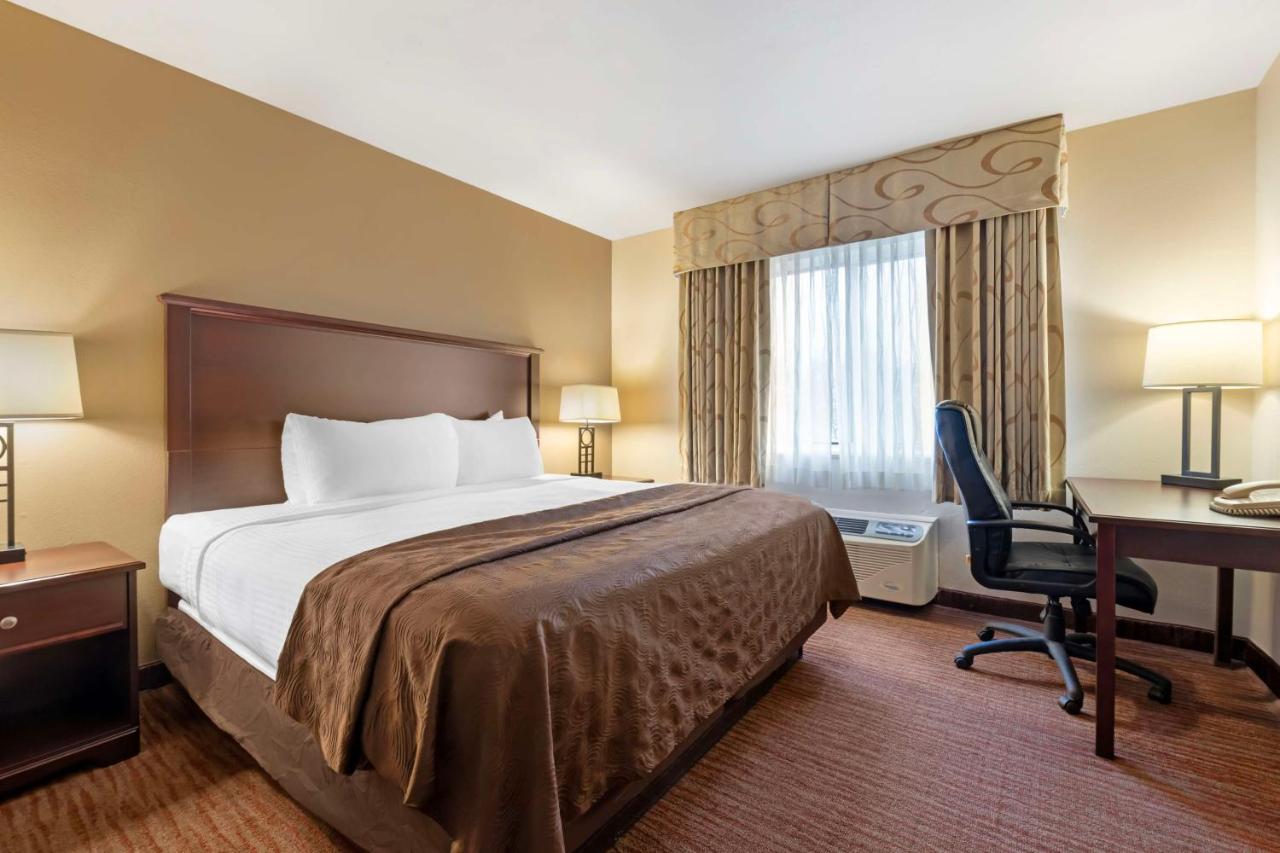 Suite with Two Queen Beds and One King Bed Room at Best Western Plus Concord Inn