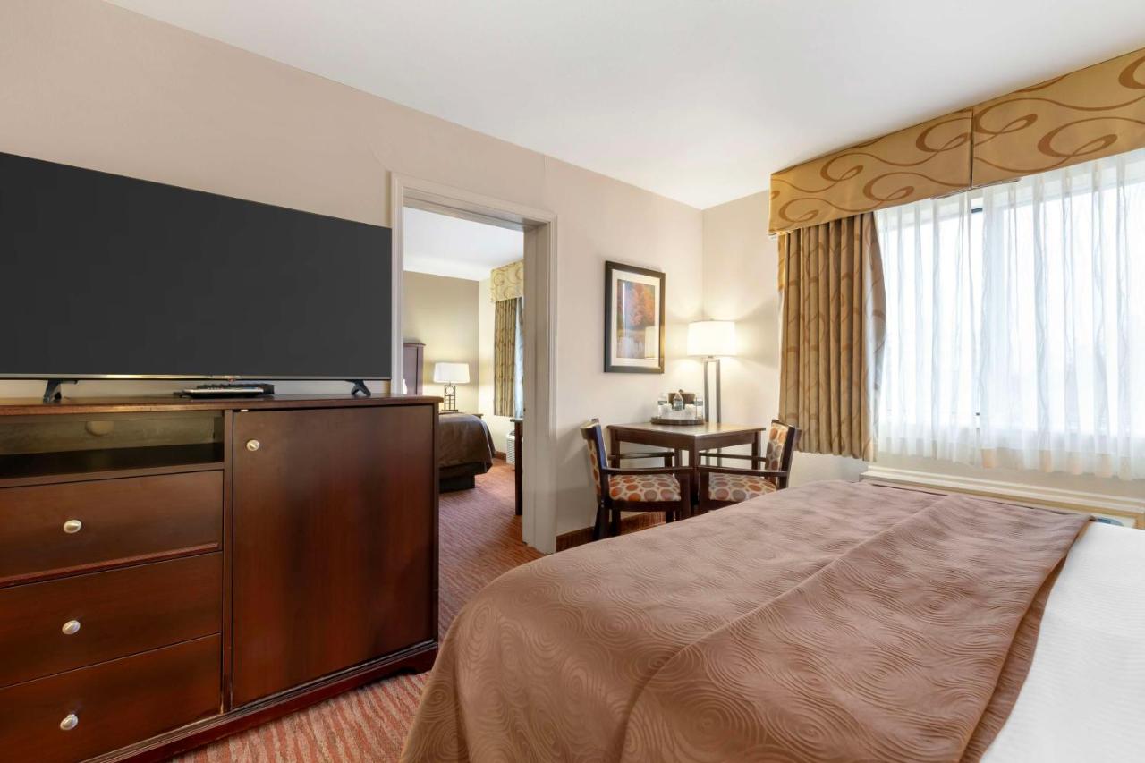 Suite with Two Queen Beds and One King Bed Room at Best Western Plus Concord Inn