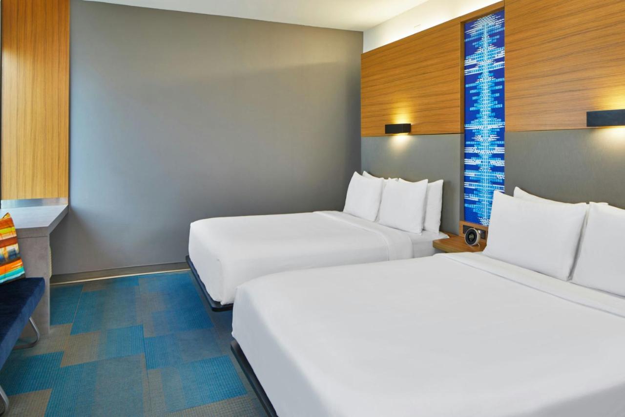 Guest room, 2 Queen at Aloft by Marriott Austin at The Domain