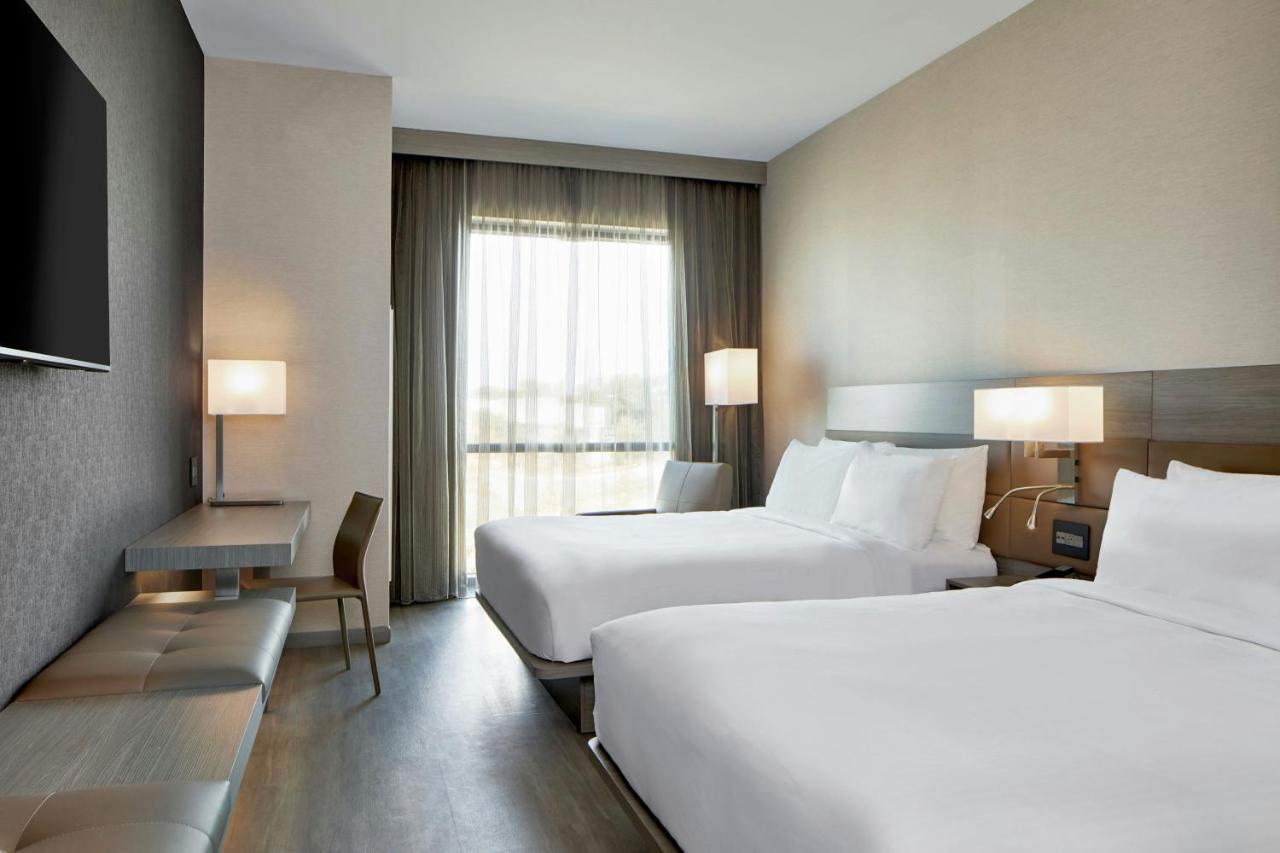 Queen Room with Two Queen Beds - Hearing Accessible at AC Hotel by Marriott Austin Hill Country