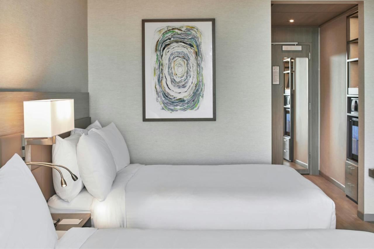 Queen Room with Two Queen Beds - Hearing Accessible at AC Hotel by Marriott Austin Hill Country