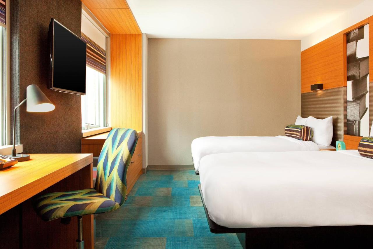Traditional Queen Room with Two Queen Beds and Roll-in Shower - Mobility and Hearing Accessible at Aloft by Marriott Chicago Downtown River North