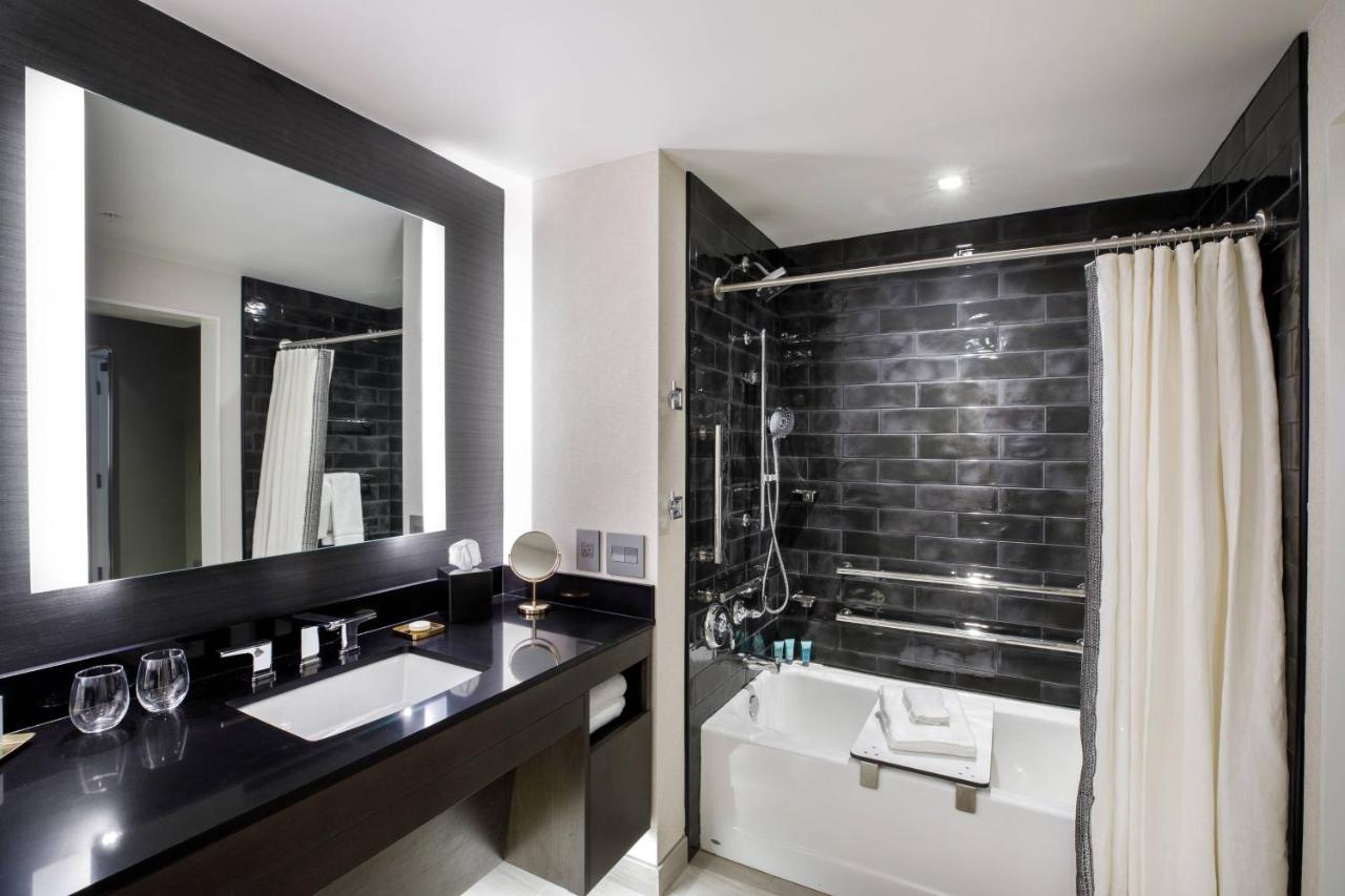 Deluxe King Room with Adapted Tub - Mobility and Hearing Accessible at Hotel Vin, Grapevine, Autograph Collection