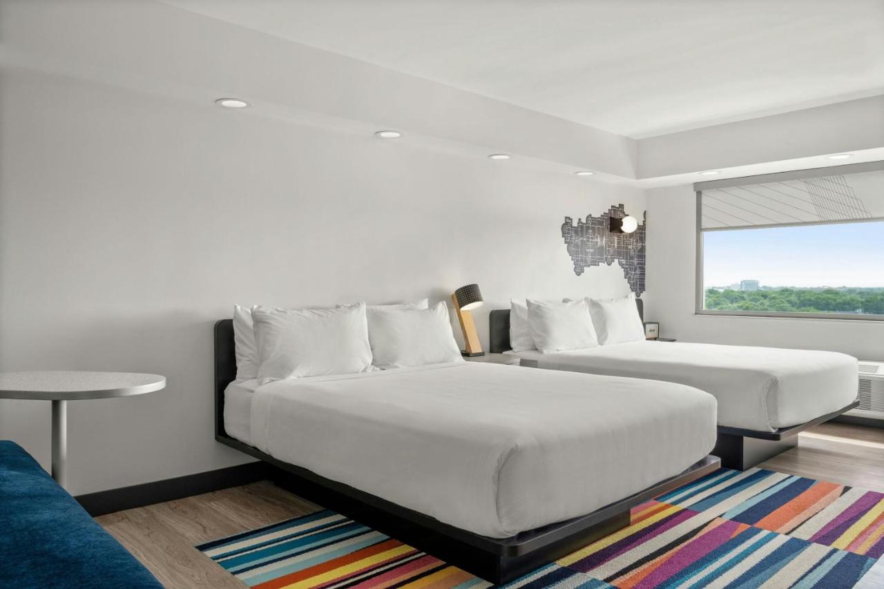 Larger Queen Room with Two Queen Beds at Aloft by Marriott Chicago Schaumburg