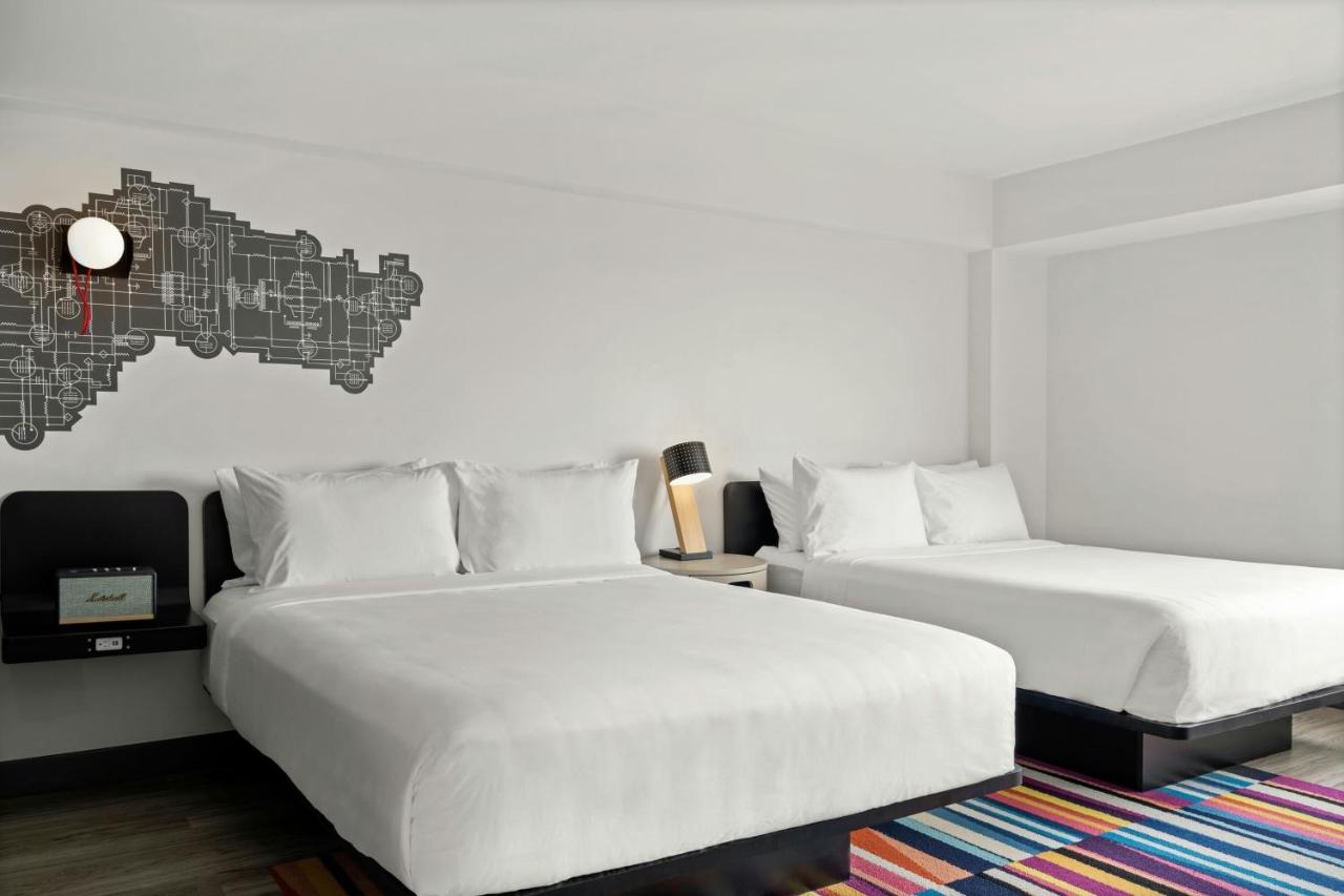 Queen Room with Two Queen Beds at Aloft by Marriott Chicago Schaumburg