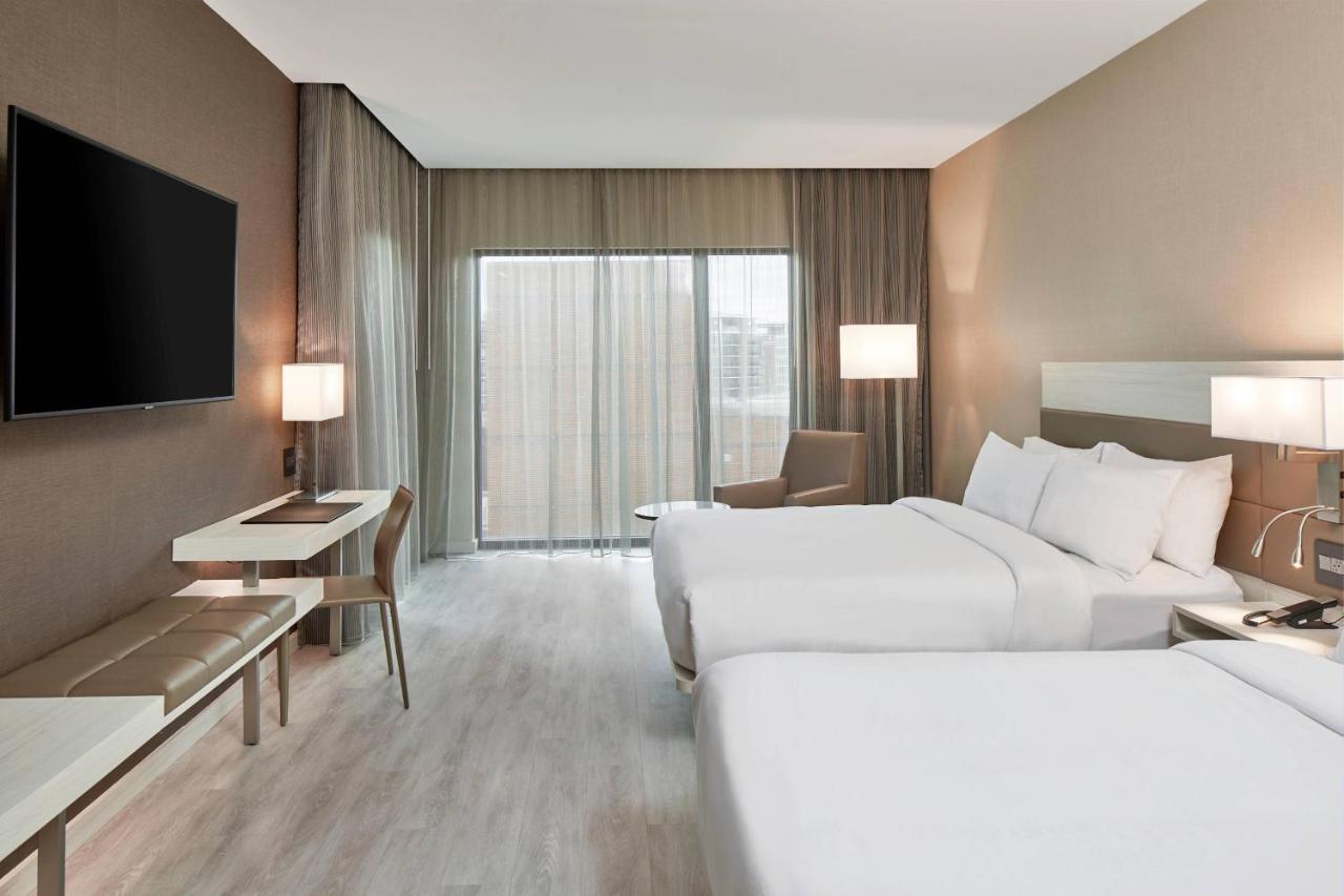 Corner Room with Two Queen Beds and City View at AC Hotel By Marriott Greenville