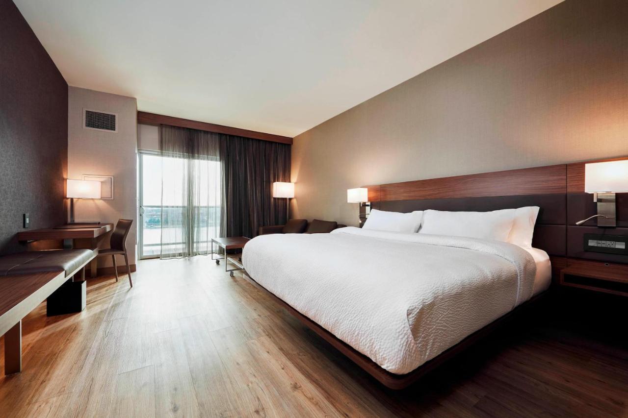 Guest room, 1 King, Ohio River view, Balcony at AC Hotel by Marriott Cincinnati at The Banks