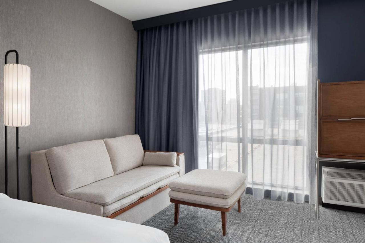 King Room with Sofa Bed and Roll-in Shower - Mobility and Hearing Accessible at Courtyard by Marriott Lansing Downtown