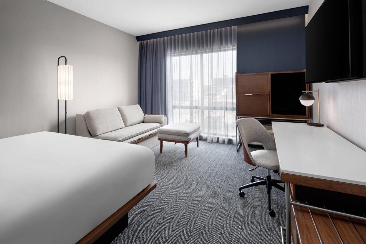 King Room with Sofa Bed and Roll-in Shower - Mobility and Hearing Accessible at Courtyard by Marriott Lansing Downtown
