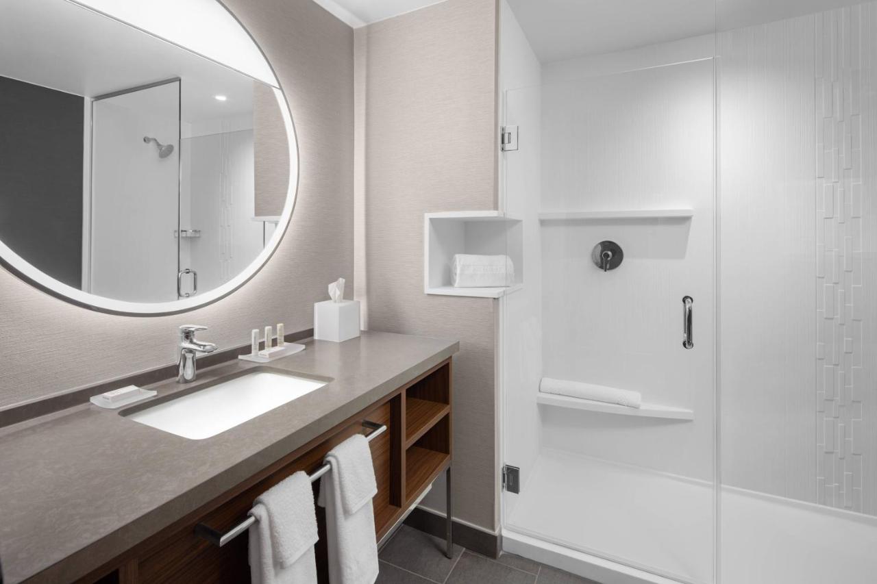 King Room with Sofa Bed and Roll-in Shower - Mobility and Hearing Accessible at Courtyard by Marriott Lansing Downtown