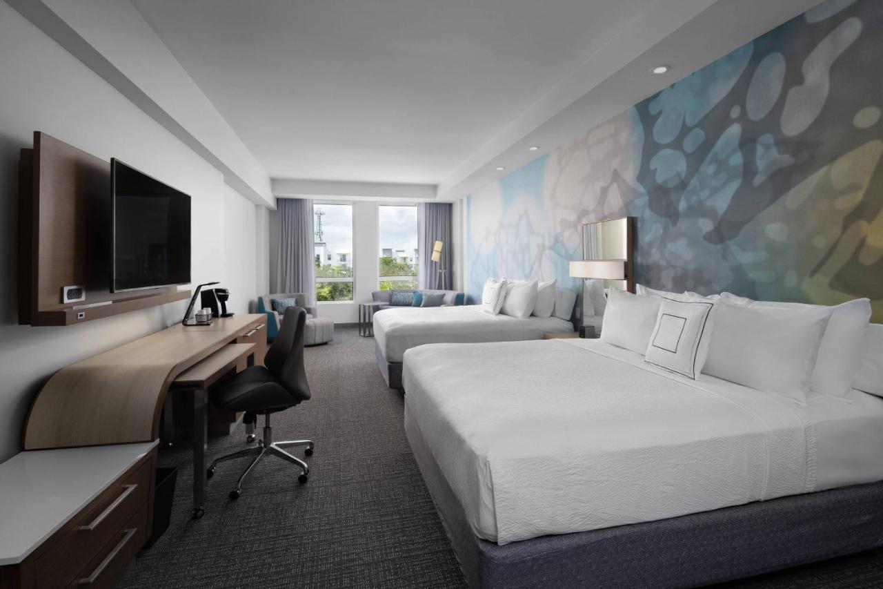 Larger Guest room, 2 King, Sofa bed at Courtyard by Marriott Delray Beach