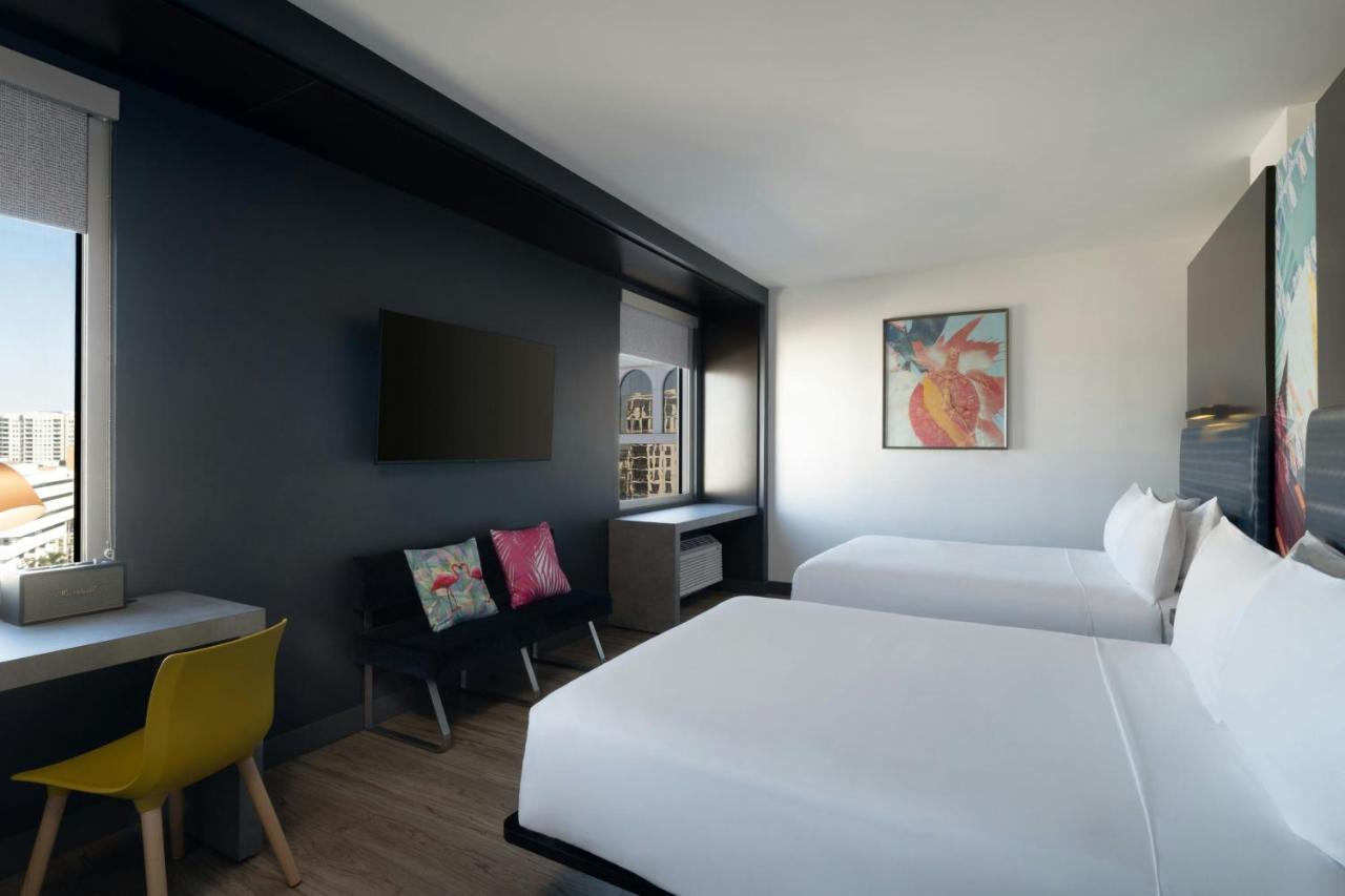 Splash Double Queen with 2 Queen Beds - Poolside view at Aloft by Marriott Sarasota