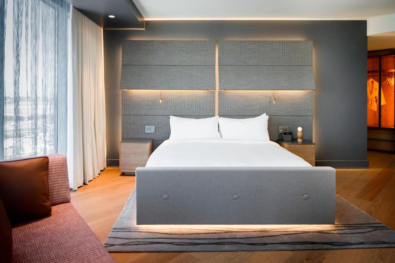 Corner King Guest Room with Balcony and Partial Bay View at Hotel Nia, Autograph Collection