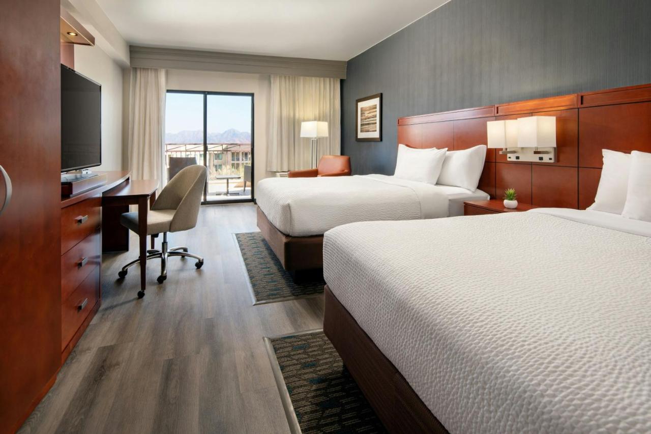 Larger Executive Queen Room with Balcony at Courtyard Scottsdale Salt River