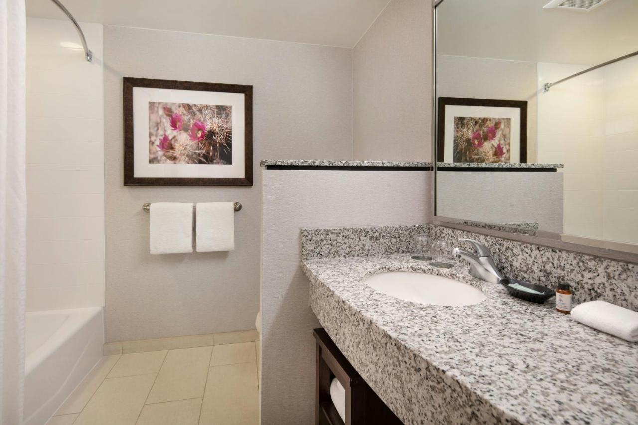 Larger Executive Queen Room with Balcony at Courtyard Scottsdale Salt River
