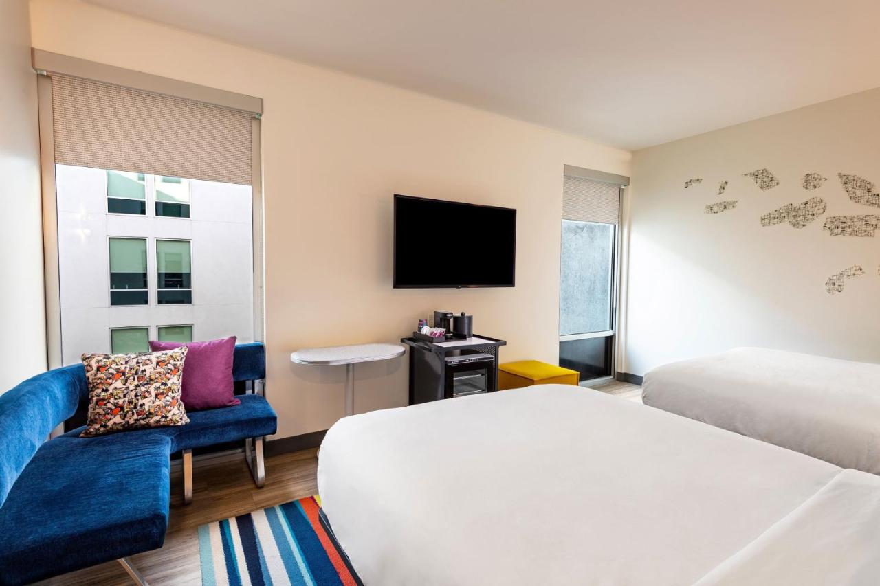 Queen Room with Two Queen Beds - Hearing Accessible at Aloft by Marriott Savannah Downtown Historic District