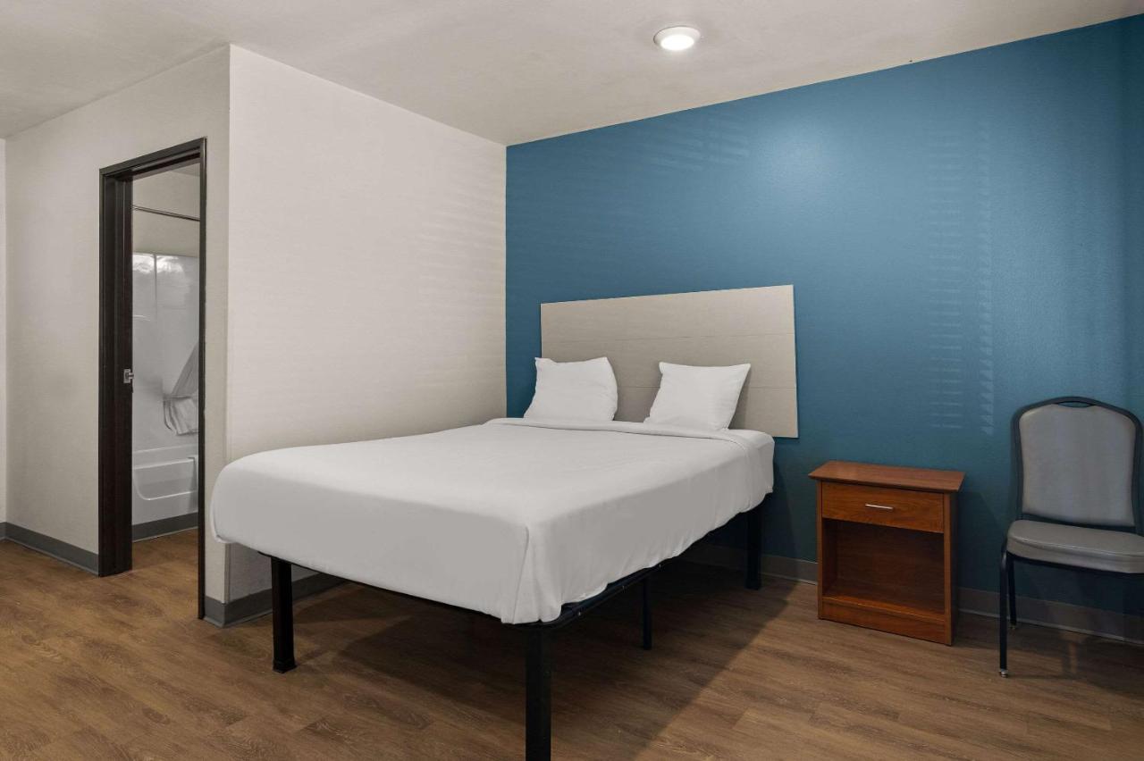 Queen Room at WoodSpring Suites Champaign near University