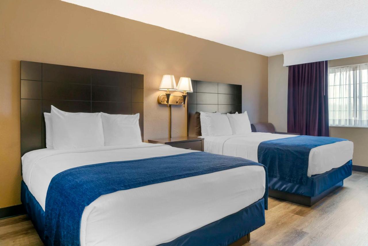 Queen Room with Two Queen Beds and Mobility Accessible Roll-In Shower at Best Western Greenfield Inn