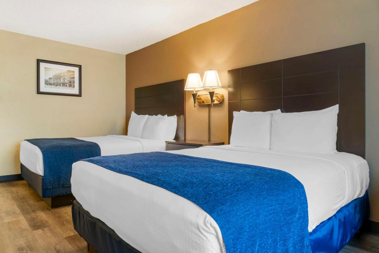 Queen Room with Two Queen Beds and Mobility Accessible Roll-In Shower at Best Western Greenfield Inn