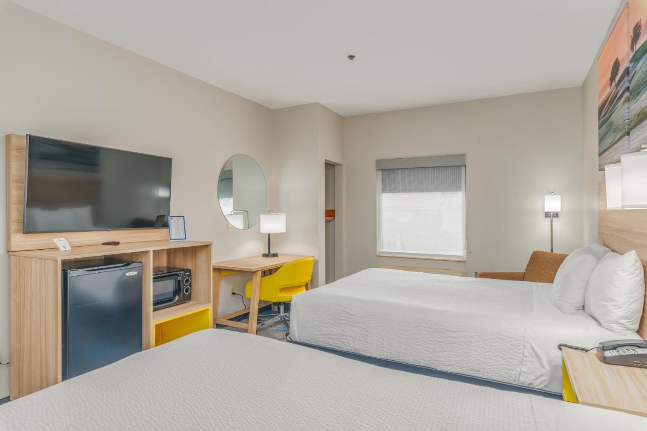 Queen Room with Two Queen Beds - Non-Smoking at Days Inn & Suites by Wyndham Prattville-Montgomery