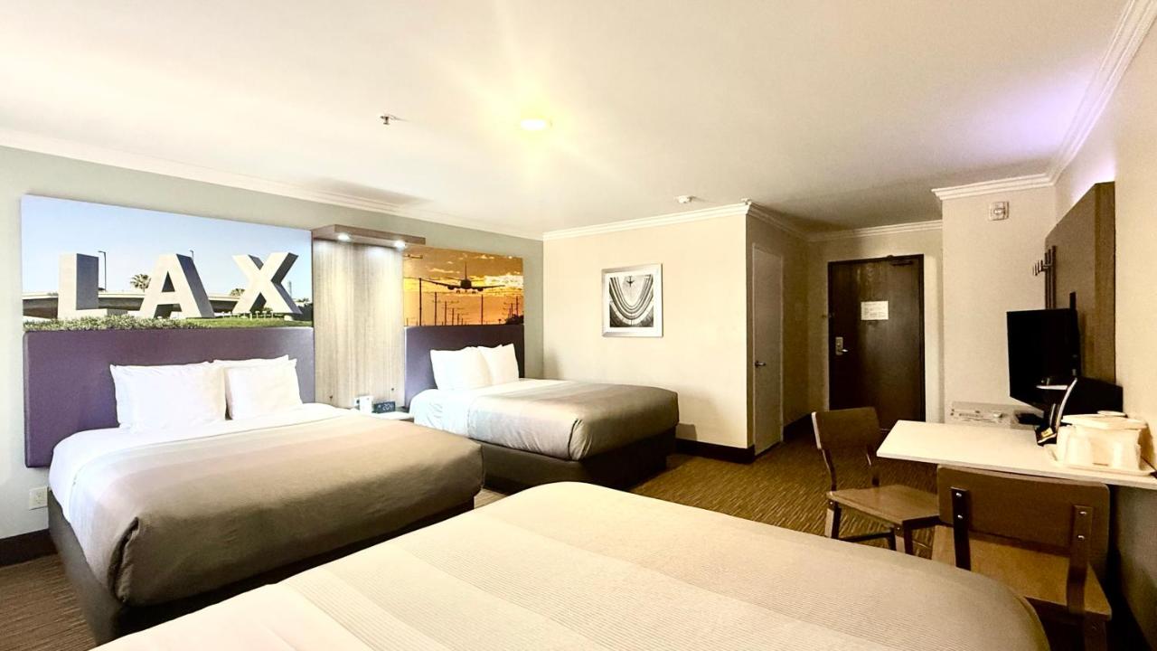 Family Room, 3 Queen Beds, Accessible Tub, Non Smoking at Quality Inn & Suites Los Angeles Airport - Stadium District
