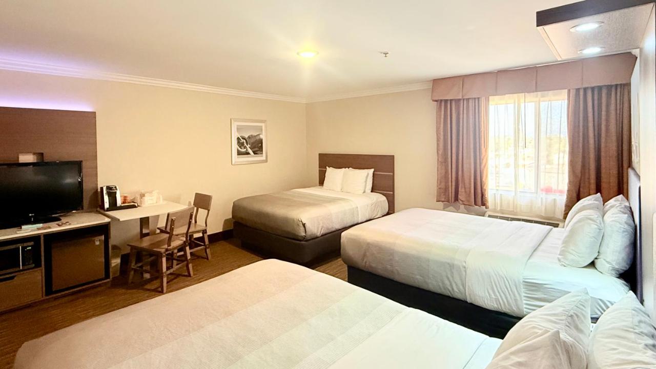 Family Room, 3 Queen Beds, Accessible Tub, Non Smoking at Quality Inn & Suites Los Angeles Airport - Stadium District